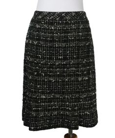 Expertly crafted by Chanel, this black and white tweed skirt in size 10 showcases a classic and timeless design. Pink detailing adds a touch of femininity to the sophisticated piece. Made with high-quality materials, this skirt is a versatile addition to any wardrobe, perfect for both formal and casual occasions. Authe Channel Clothes, White Tweed Skirt, Chanel Skirt, Chanel Black And White, Black And White Tweed, White Tweed, Tweed Skirt