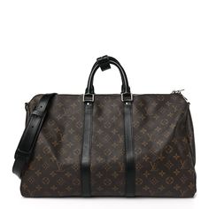 This is an authentic LOUIS VUITTON Monogram Macassar Keepall Bandouliere 45. This stylish duffel is crafted of classic Louis Vuitton monogram coated toile canvas in brown with black leather accents. The bag features black leather top handles, trim, an optional adjustable shoulder strap with polished silver hardware. The top zipper opens to a burgundy fabric interior. Louis Vuitton Monogram Bag, Louis Vuitton Travel, Burgundy Fabric, Black Leather Top, Louis Vuitton Keepall, Louis Vuitton Damier Ebene, Monogram Bag, Leather Accents, Louis Vuitton Shoulder Bag