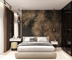 a large bed sitting in a bedroom next to a tall wall with palm leaves on it