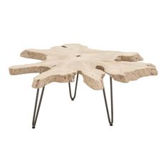 a wooden table with metal legs and a large piece of wood on the top that is shaped like a flower