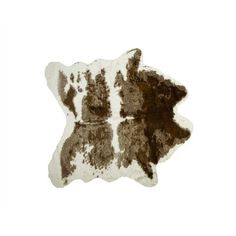 a brown and white cowhide rug on a white background