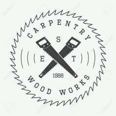 two crossed wrenches with the words carpentry and wood works inside it on a white background