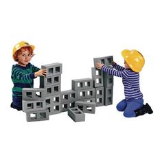 two children playing with blocks and construction hats