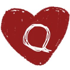 a red heart with the letter q drawn in white ink on it's side