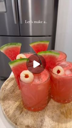 watermelon drink in glasses with garnishes on the rim