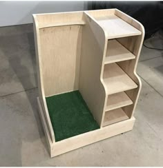 a wooden cabinet with shelves and green carpet