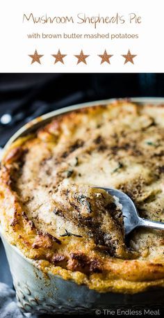 a close up of a pie in a pan on a table with the words mushroom shepherd's pie above it