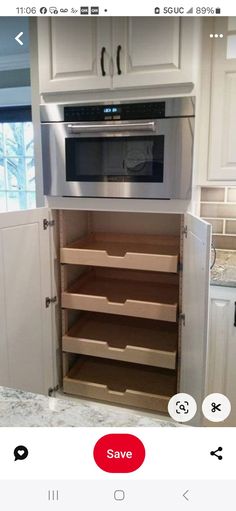 an appliance is open to show the inside of a kitchen