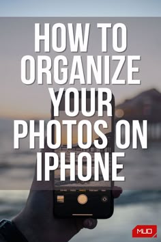 someone holding up their cell phone with the text how to organize your photos on iphone