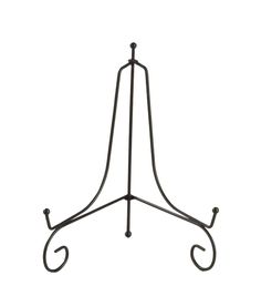 a wrought iron stand with two hooks on each end and one hook at the top