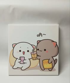 two cats are eating ice cream and one is holding a cup with the other hand