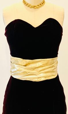 "Vintage from 1980's  Deep red velvet  Gold Sash  Strapless  Boning through bodice Lined Column shape  Floor length  Split at to the knee at the front  Zipper at the back  Would best fit XS pit to pit - 16\" waist  - 26\" hips - 36\" dress length - 50\" length of split at front - 24.5\"" Velvet Strapless Dress, Deep Red Velvet, Gold Sash, Plunge Dress, Halloween 2024, Prairie Dress, Hand Knitted Sweaters, Summer Set, Cute Sets