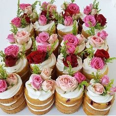 there are many small cakes with flowers on them