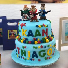 a birthday cake with three bears on top and the words kaan thago written on it