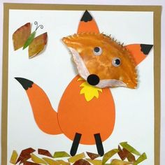 a card with a paper cut out of a fox