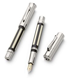 three fountain pens sitting next to each other on top of a white surface with the words graff - won faber castell