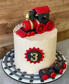 a birthday cake with a train on top