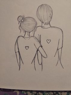 two people standing back to back with their arms around each other and hearts on their backs