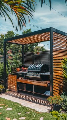 an outdoor bbq grill in the middle of a garden