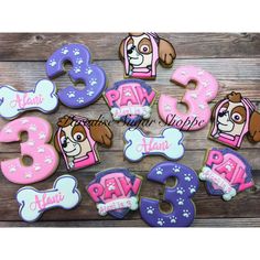 decorated cookies with dog names and numbers for birthdays or any occasion to be eaten