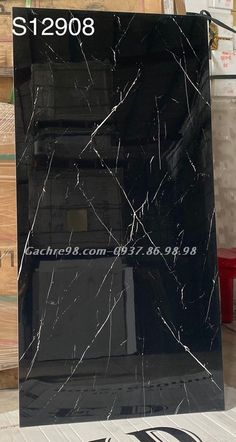 the black marble is being displayed for sale