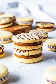 several cookies with chocolate frosting on them