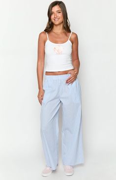 Blue Stripe Pants

How to style:
Our Mahalia Light Blue Stripe Pants are a Summer () dream with their Lightweight material and adorable stripe print! Perfect for your next get away or brunching with the girls, you'll find any excuse to wear these ultra comfy pants ()! Pair with your fave white basic top () and sandals to complete the look.

Features:


  
 * Elastic waistband
 
 * Side pockets
 
 * Full length
 
 * Loose fit
 
 * Lightweight material
 
 * Wide leg style
 
 * Non-stretch material White Basic Top, Prom Midi Dress, 60's Dress, Shop Pants, Summer Playsuit, Stripe Pants, Comfy Pants, Strapless Tops, Long Crop Top