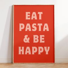 a red poster with the words eat pasta and be happy written in white on it