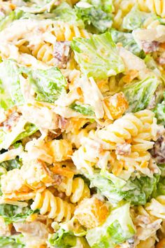 pasta salad with chicken and lettuce in a bowl