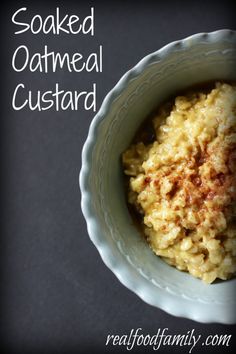 cooked oatmeal custard in a white bowl on a black table