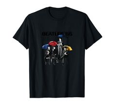 the beatles t - shirt with three people holding umbrellas in front of their faces