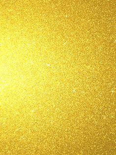 an airplane is flying in the sky with gold glitter on it's back end