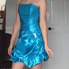 Short Semi Formal Dress. Never Altered. Has Tags Still. Layered Skirt And Jewels On It. Never Worn Before Except For The Pic. Quite Flattering!! Mama Mia Themed Hoco Dresses, Hoco Dresses Ocean Theme, Blue Embellished Mini Dress For Homecoming, Blue Homecoming Mini Dress With Contrast Sequin, Cheetah Print Prom Dress, Teal Formal Dress Mini, Lavender Gown, Short Semi Formal Dresses, Mac Duggal Dress