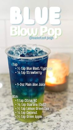 a blue and green drink sitting on top of a counter