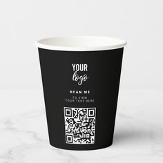 a black and white paper cup with a qr code on it