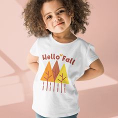 "Hello Autumn Organic cotton kids t-shirt clothing. Check out matching \"Hello Fall design adult t-shirt\": https://www.etsy.com/listing/1054384063/hello-fall-simple-autumn-tree-design?ref=shop_home_active_2&pro=1&frs=1 Put your kids in a t-shirt that's cute, super comfortable, and made of natural fabrics! This 100% organic cotton tee is sure to become their favorite! * 100% organic ring-spun combed cotton * Fabric weight: 4.57 oz/yd² (155 g/m²) * Single jersey * Medium fit * Set-in sleeves * 1× Playful Pre-shrunk T-shirt For Fall, Playful Crew Neck T-shirt For Fall, Fun White T-shirt For Fall, Playful Short Sleeve T-shirt For Fall, Playful Short Sleeve Fall T-shirt, White T-shirt For Fall Family Matching, Fall Cotton T-shirt With Custom Print, Custom Print Cotton T-shirt For Fall, Fall Graphic Tee