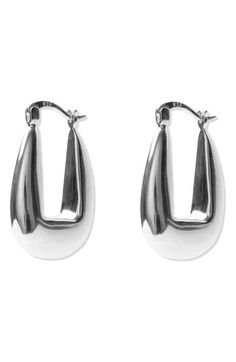 A chunky, tapered silhouette amplifies the shine of sterling silver hoops that instantly elevate any outfit. 1" drop; 1/4" width Snap-post closure Sterling silver or goldtone plate Imported Chunky Silver Earrings, Statement Earrings Silver, Silver Statement Earrings, Chunky Hoop Earrings, Sterling Silver Hoops, Keep Jewelry, Fabric Gifts, Silver Hoops, Print Gifts