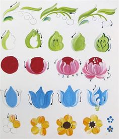 an image of various flowers and leaves painted on white paper with watercolors in it