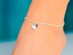 This anklet has a Hamsa charm with an evil eye. The ankle bracelet is sterling silver 925. It is a dainty piece of jewelry that is great for the summer. The anklet has an extension so it can be adjusted to fit comfortably with different shoes. I can also customize the size for you, so feel free to message me if you need a custom order, or if you have any questions. Evil Eye Anklet Silver, Silver Spiritual Anklets As Gift, Evil Eye Jewelry Bracelet, Evil Eye Anklet, Hamsa Evil Eye, Anklets For Women, Foot Bracelet, Beautiful Casual Dresses, Silver Anklet