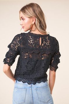 Add a touch of elegance to any outfit with the 'Romeo Romeo' balloon sleeve lace blouse! Dainty eyelash lace shapes a crew neckline, atop a contrasting crochet lace bodice framed by short, balloon sleeves. Cropped, scalloped hem finishes the flirty look. - Model is 5'9" and wearing size small. Available in black. 100% polyester. Imported. Chic Scalloped Lace Top For Fall, Black Lace Top With Crew Neck, Elegant Black Tops With Scalloped Lace, Elegant Black Top With Scalloped Lace, Elegant Black Scalloped Lace Top, Chic Scalloped Lace Fall Blouse, Spring Lace Trim Crew Neck Top, Feminine Top With Lace Cuffs And Puff Sleeves, Feminine Puff Sleeve Top With Lace Cuffs