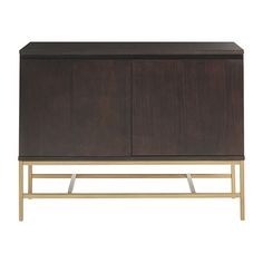 the sideboard is made from wood and has two brass legs, one with an open door