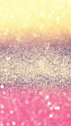 pink, yellow and white glitter background with blurry light in the middle on top