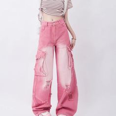 Step into summer with flair in our Pink High Waist Wide Leg Jeans, tailored for the fashion-forward and crafted for comfort. Blending classic vintage vibes with a touch of hip hop street style, these jeans are your go-to for making a bold statement while prioritizing comfort. Key Features High Waist Design: Offers a flattering fit that accentuates your waistline. Wide Leg Style: Provides a relaxed feel and a trendy look. Quality Fabric: Made from a blend of cotton and polyester, ensuring durability and comfort. Eye-catching Details: Features buttons, pockets, and subtle ripped decorations for a chic, lived-in look. Seasonal Versatility: Perfect for spring and summer, but stylish enough to wear year-round. Special Attributes What sets these trousers apart is their unique color and design co Jean Rose, Hip Hop Street Style, Jeans Rosa, High Waist Wide Leg Jeans, Vintage Preppy, Style Hip Hop, Jeans Cargo, Pink Jeans, 90s Grunge