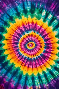 a colorful tie - dyed background that looks like it is in the middle of a spiral