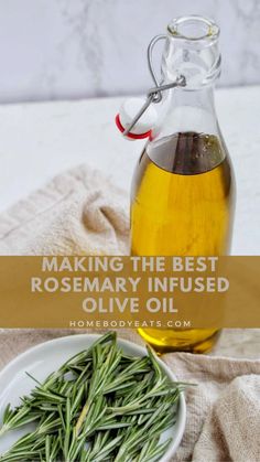 a bottle of rosemary oil next to a white plate with green beans on it and the words making the best rosemary infused olive oil