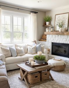 a living room filled with furniture and a fire place