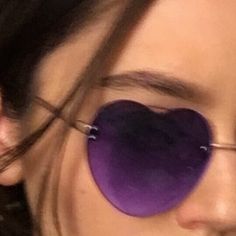 a close up of a person wearing sunglasses