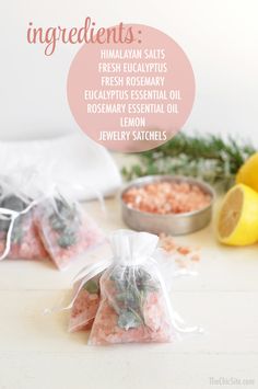 ingredients for himalayan salts in bags on a table with lemons and rosemary sprigs