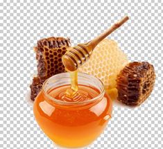 honey in a glass jar and some pieces of honey on the table png clipart