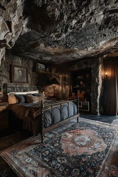 a bed sitting in the middle of a bedroom next to a stone wall and ceiling